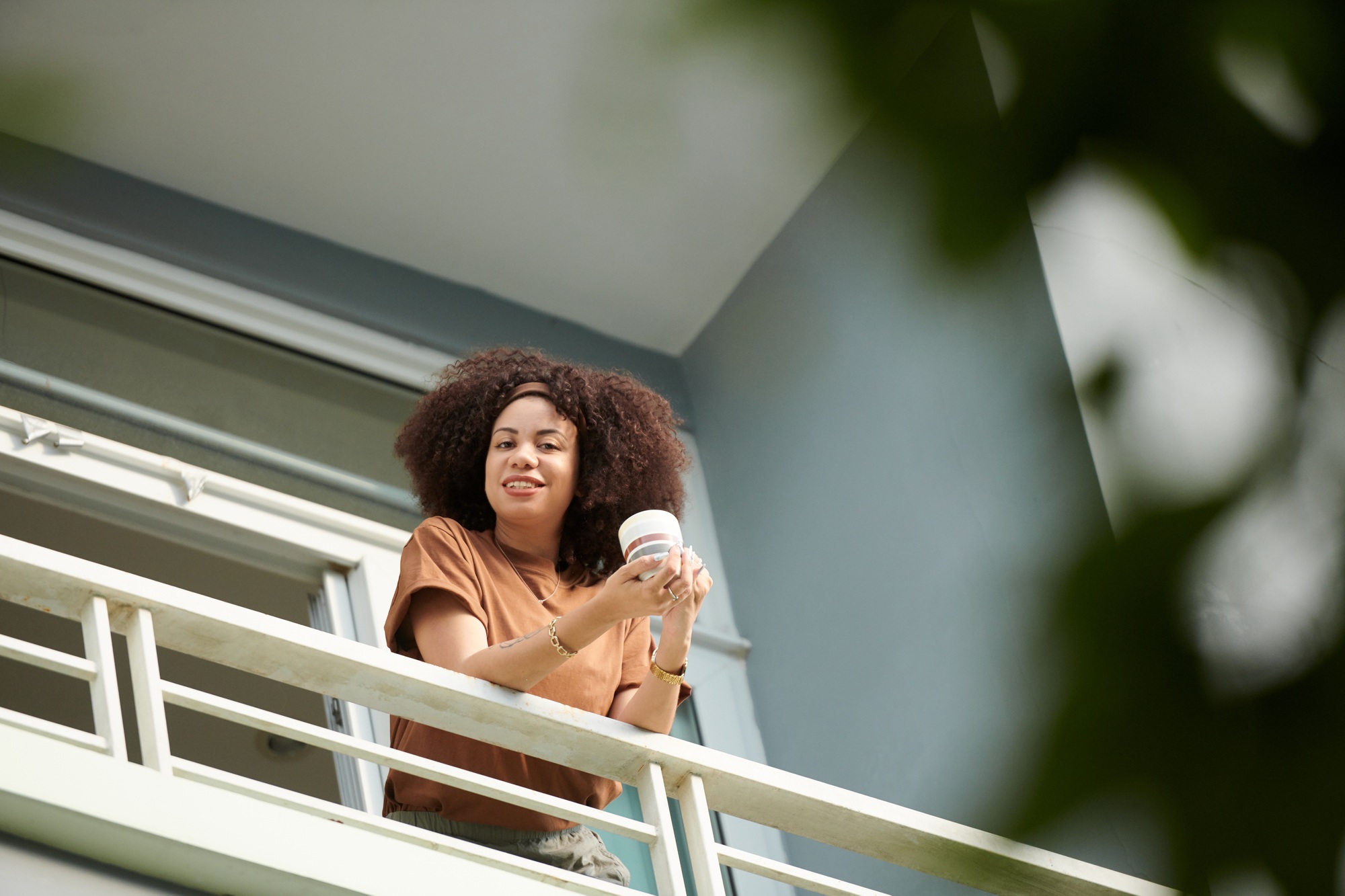 Joyful Woman with Cup of Coffee